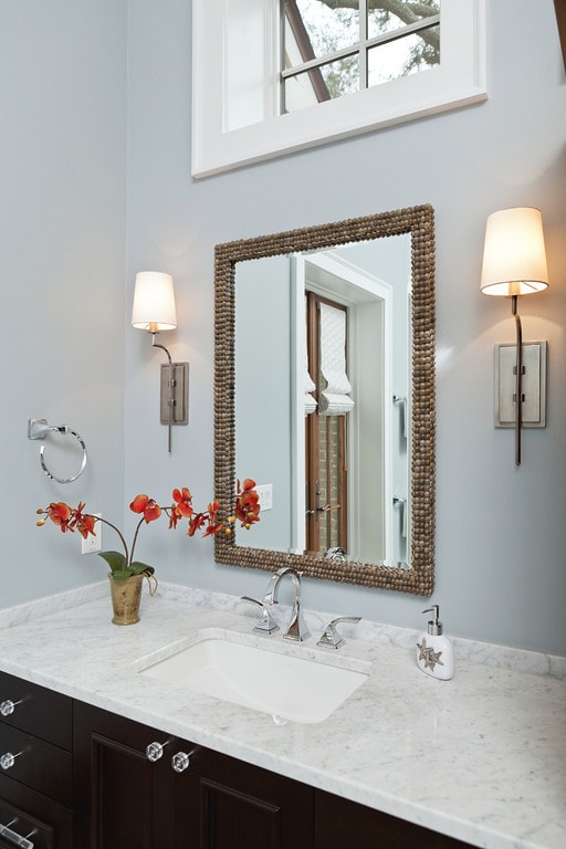 contemporary bath with marble countertop crystal knob pulls