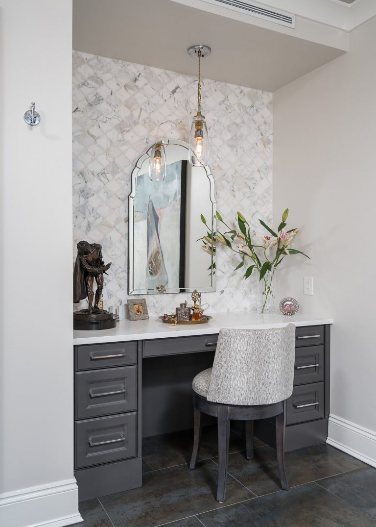 bathroom built-in vanity with grey cabinet and silver frame mirror charcoal grey floor tile