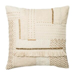 beige and brown throw pillow with beads