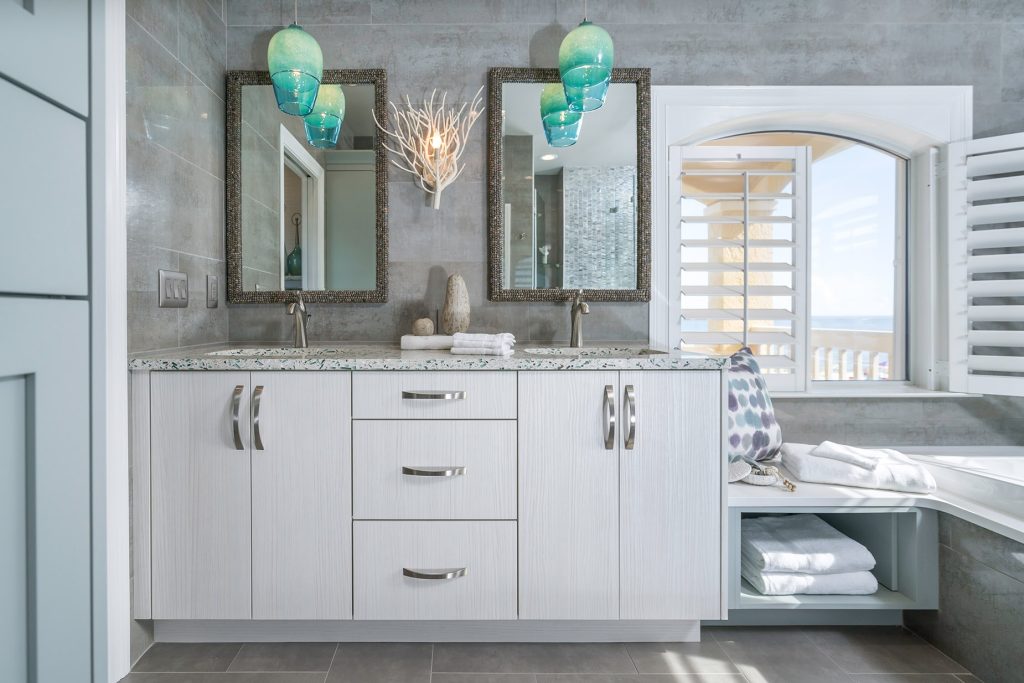 Neutral Colors with Blue pendants Coastal Bathroom Remodel in Pensacola Florida