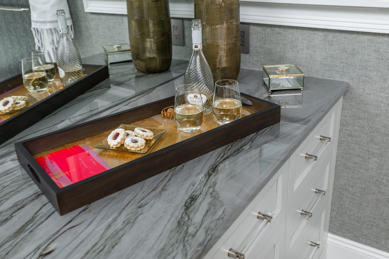 Master Bathroom grey counter top with home decor