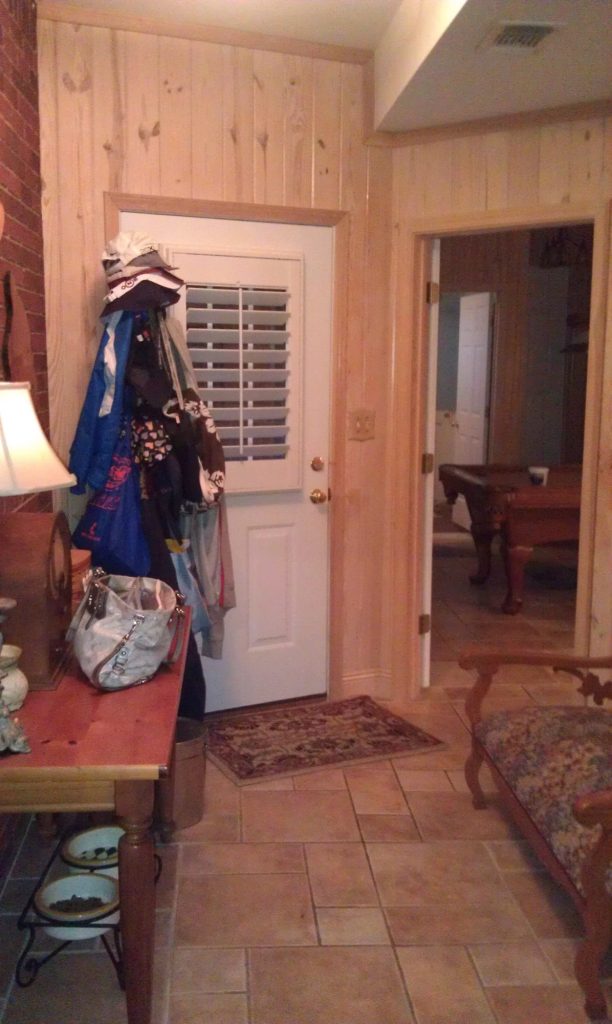 before picture of a hall used as mudroom