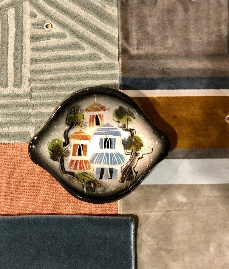 Vintage sasha brastoff pottery piece inspired the color palette and is laid on different textiles.